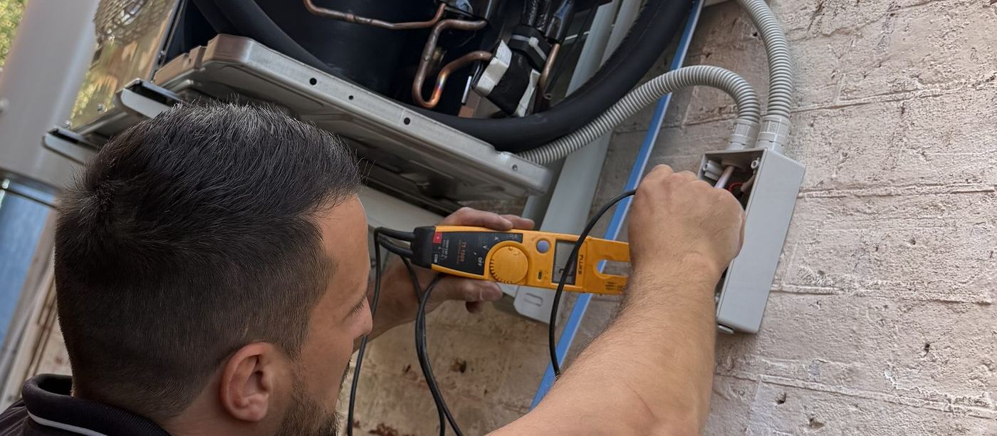 Licensed M Tech electrician working on a switchboard in Perth
