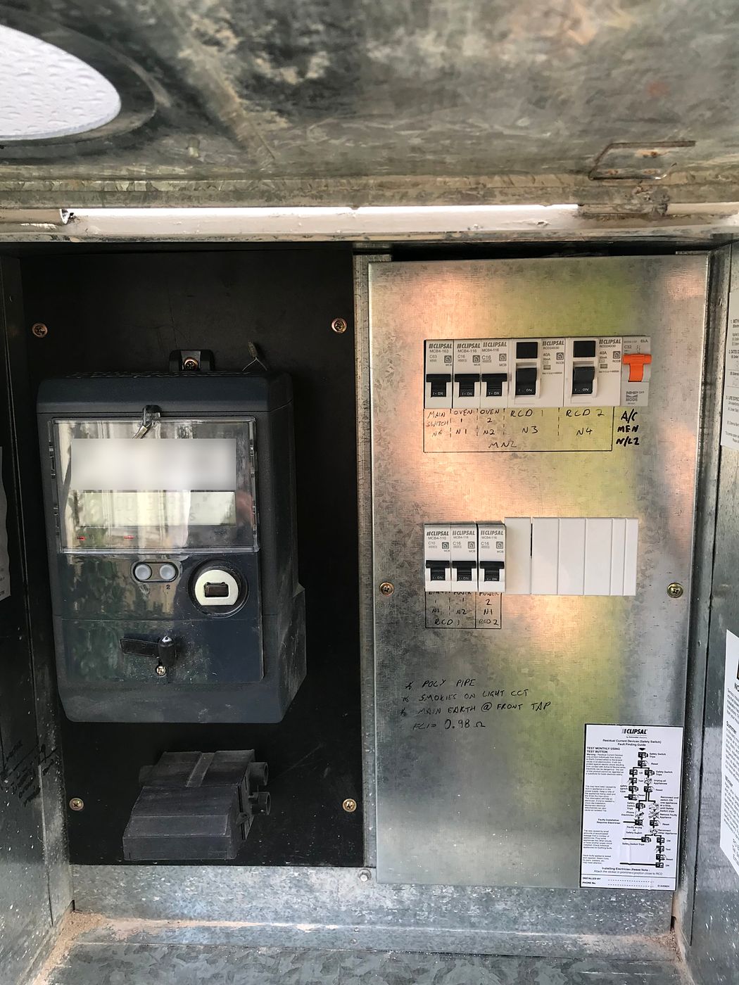 Finished switchboard upgrade with two RCDs, labelled circuits and spare poles beside the meter