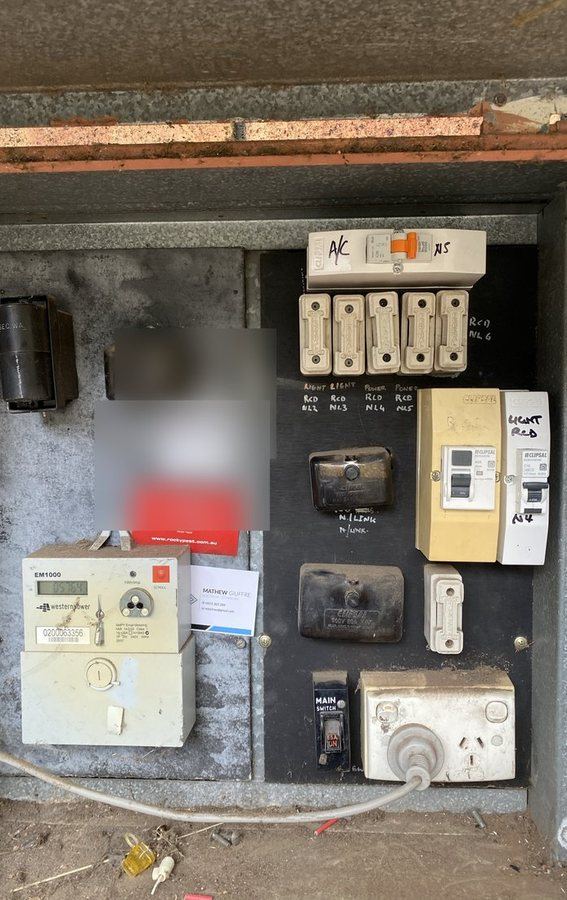 Old Perth switchboard with ceramic rewireable fuses